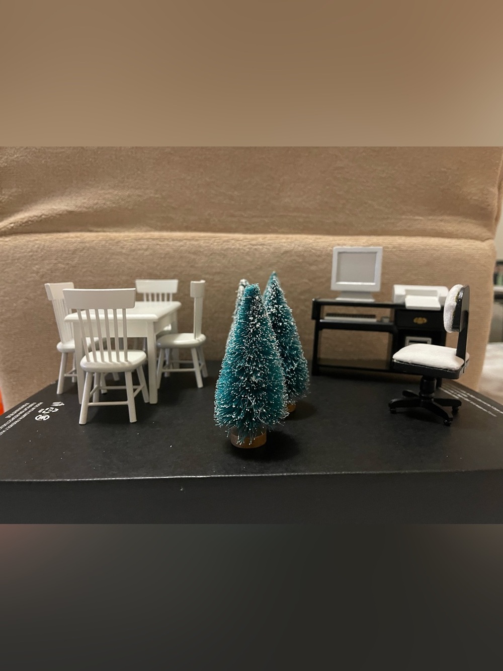 Dollhouse furniture and trees